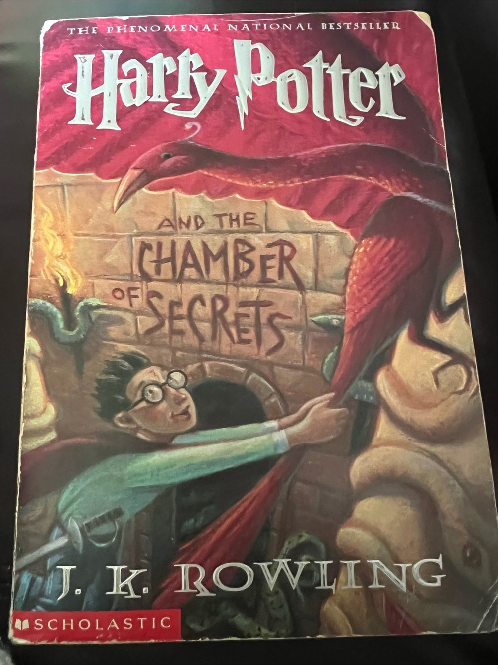Harry Potter and the Chamber of Secrets By: J.K. Rowling 
Paperback